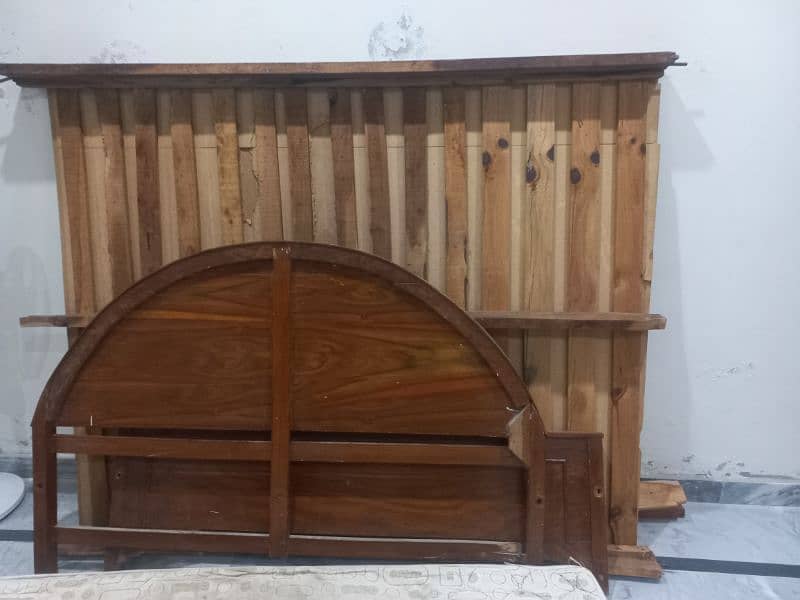 wooden bed with mattress bed is opened it would be assembled by buyer 1