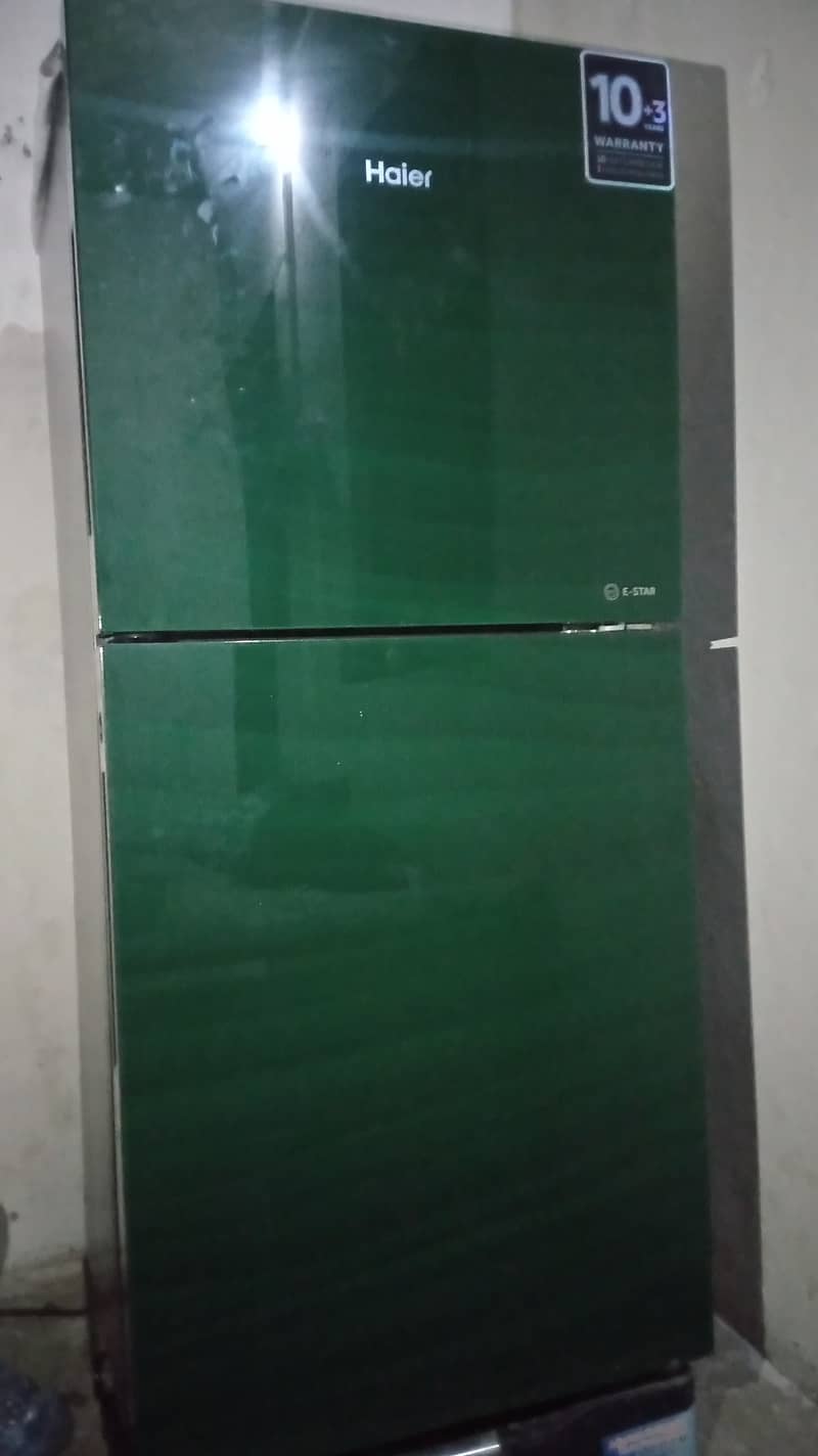 Haier fridge medium size just 2 month used ten by ten condition, 2