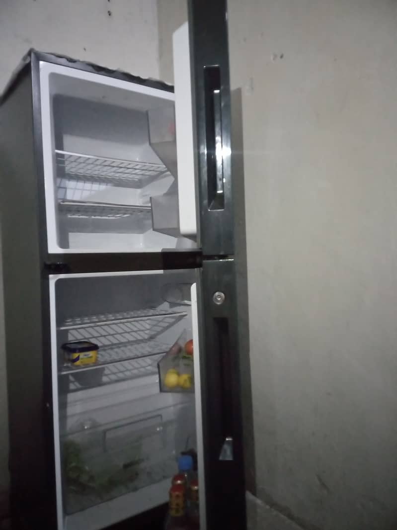 Haier fridge medium size just 2 month used ten by ten condition, 3