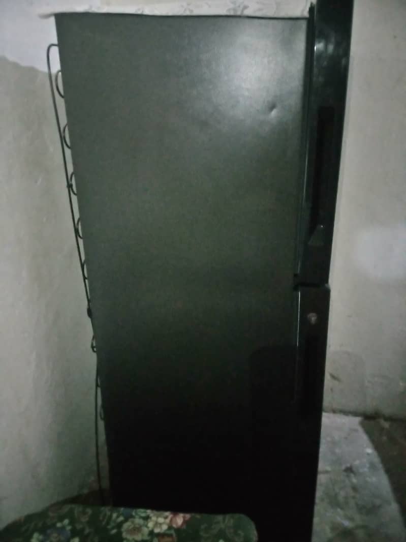 Haier fridge medium size just 2 month used ten by ten condition, 11