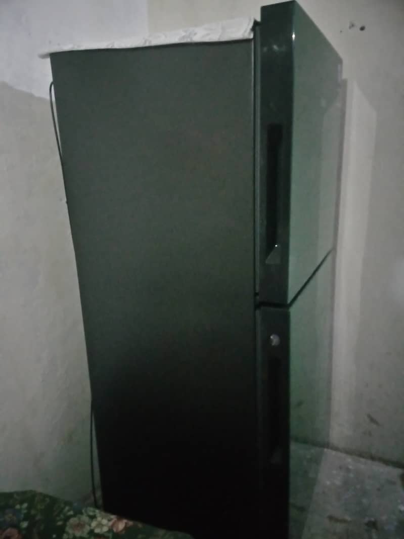 Haier fridge medium size just 2 month used ten by ten condition, 12