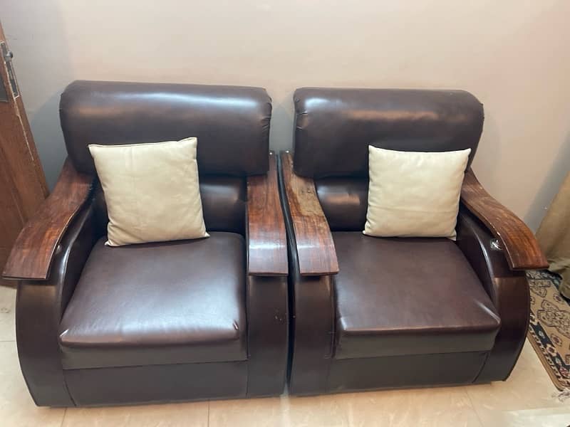 Brown sofa set with cushions 1