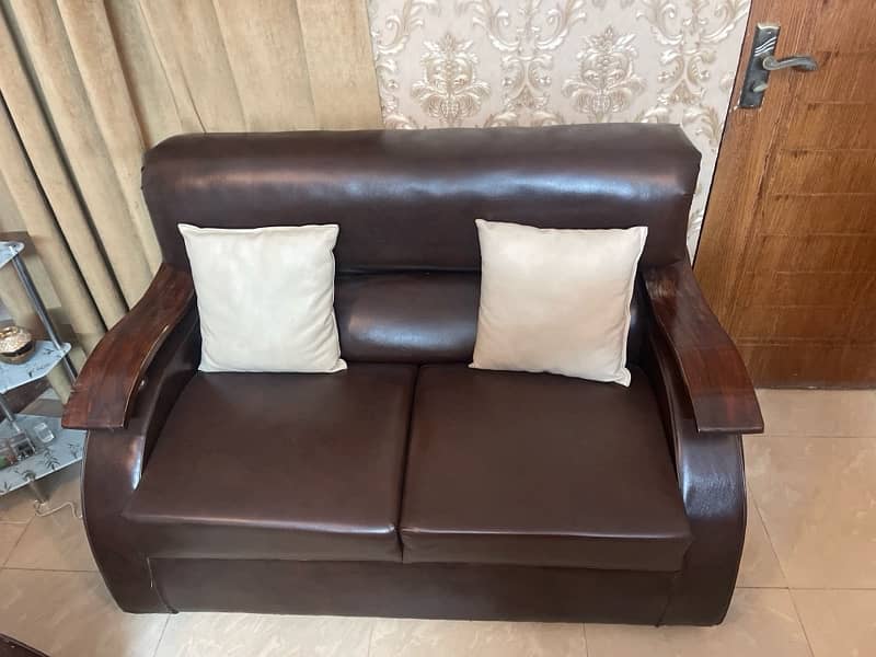 Brown sofa set with cushions 2