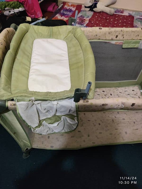 Foldable Baby Cot with diaper changing area 2