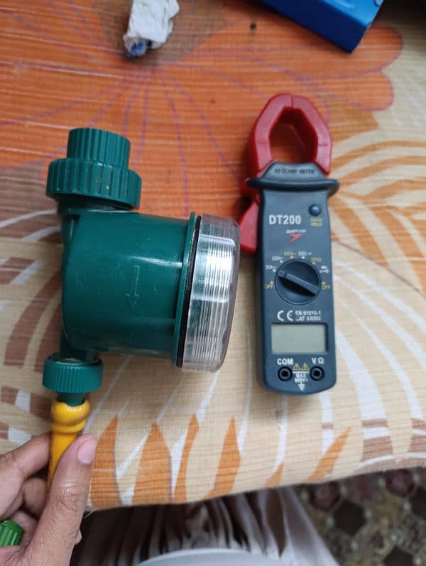 Clamp meter and automatic timer device for gardening water 2