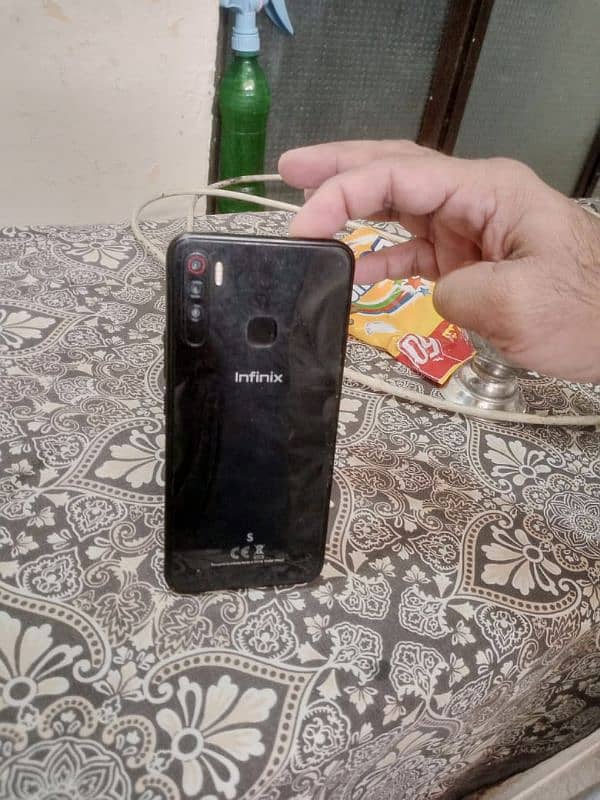 infinix S5 lite 4 64 with charger only 1