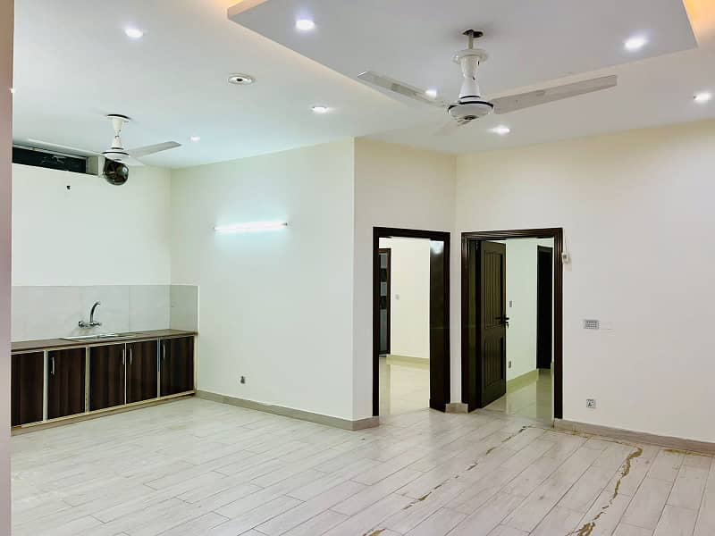 10 Marla Brand New House With Basement Available for rent in Overseas A Block Bahria Town Lahore 1