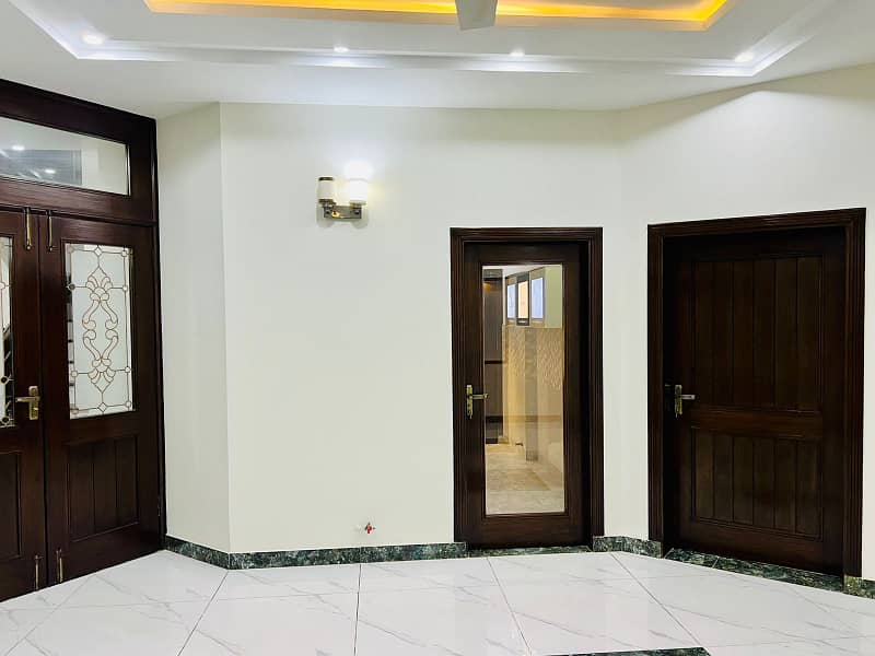 10 Marla Brand New House With Basement Available for rent in Overseas A Block Bahria Town Lahore 13