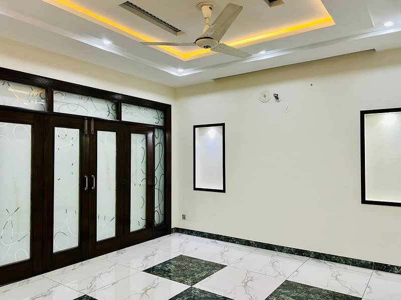 10 Marla Brand New House With Basement Available for rent in Overseas A Block Bahria Town Lahore 15