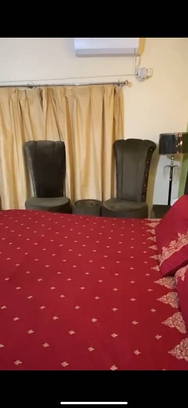 king size bed with dressing table and 2 single sofas with tea table 1