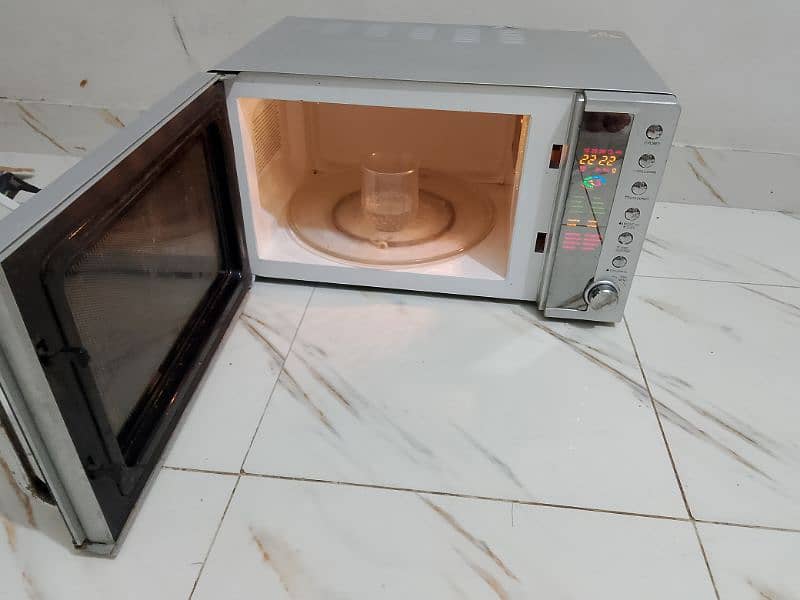 Dawlance microwave oven 2 in 1 microwave + grill cooking 1