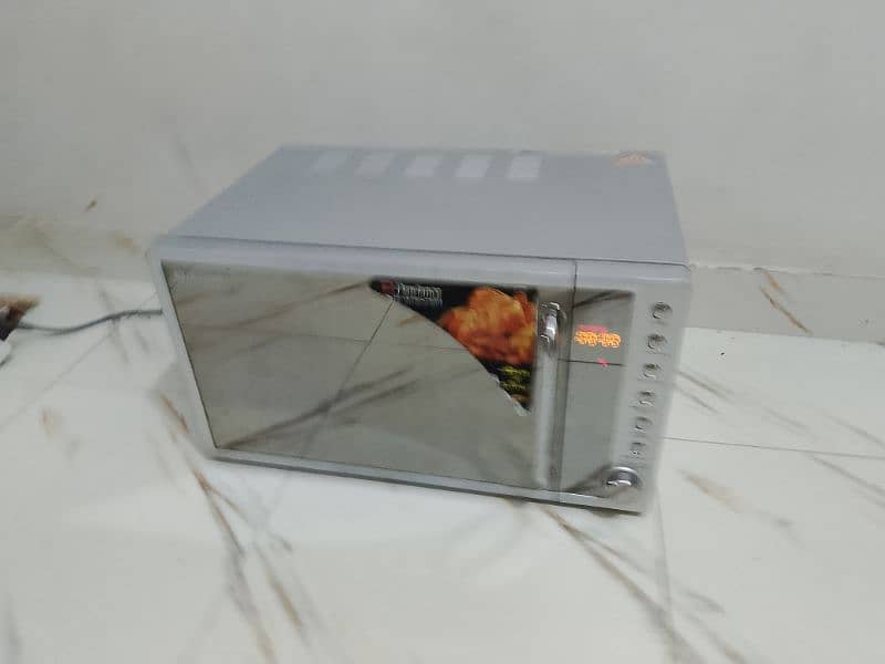 Dawlance microwave oven 2 in 1 microwave + grill cooking 2