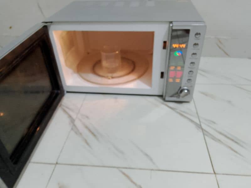 Dawlance microwave oven 2 in 1 microwave + grill cooking 4