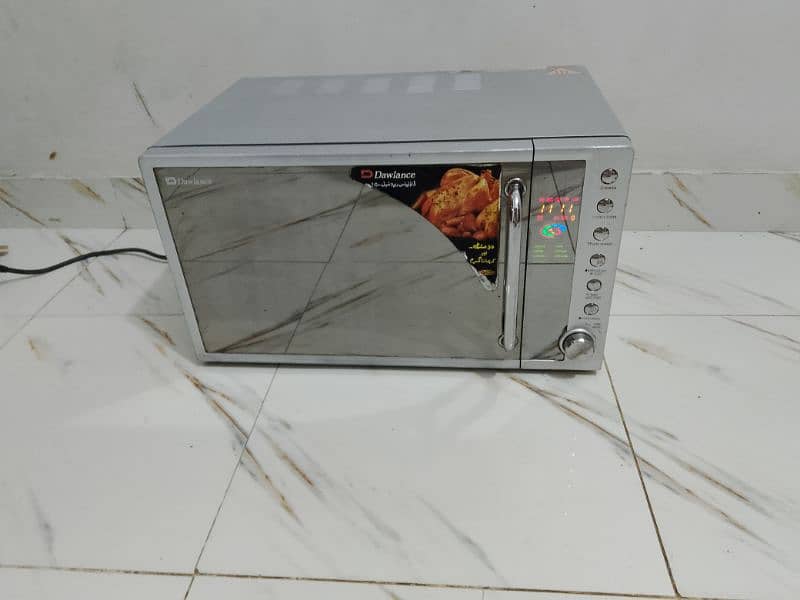 Dawlance microwave oven 2 in 1 microwave + grill cooking 5