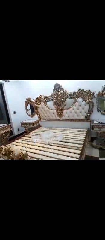 bed with side tables sofas and dressing table 0