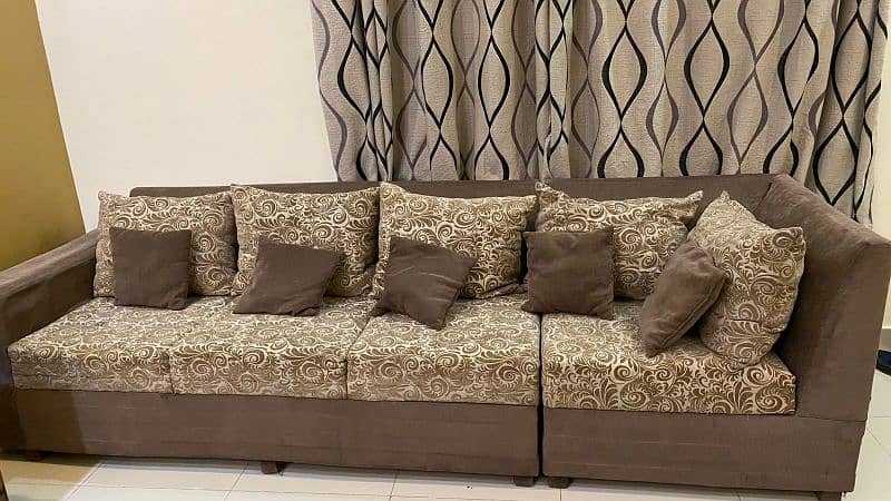 L-shaped sofa golden colour 0