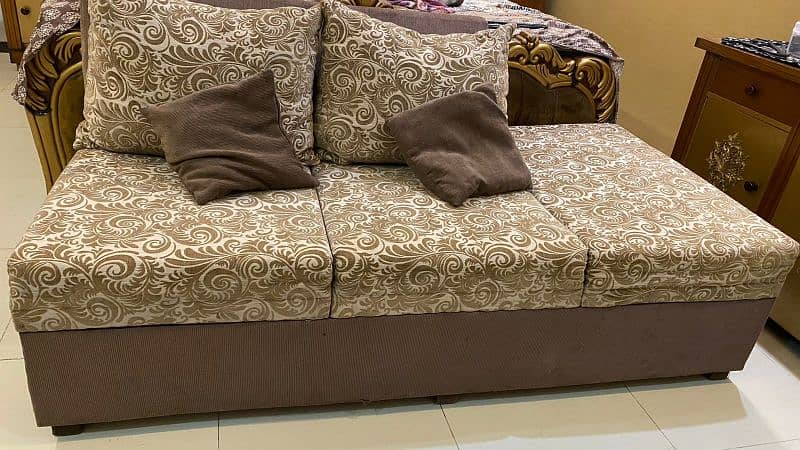 L-shaped sofa golden colour 1