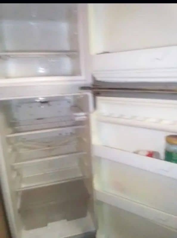 medium size fridge new condition 1