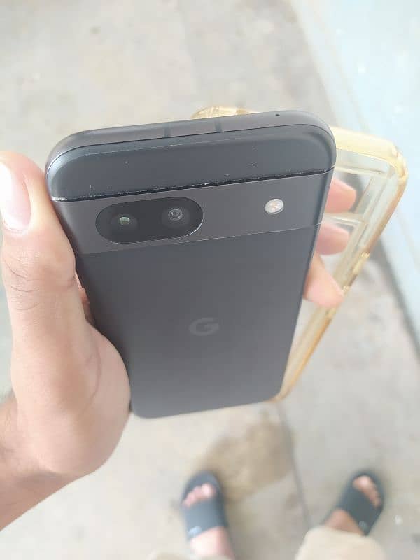 Google Pixel 8a with charger and cover 4