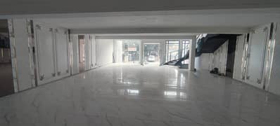 8 Marla full plaza 100% orignel pics 5 floors opposit gol markit