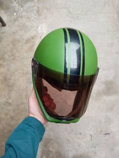 CD 70 Bike helmet wrap with green paper.