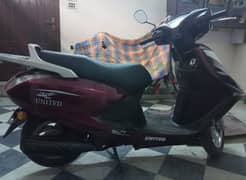 United scooty 100 cc argent for sale 03256137554