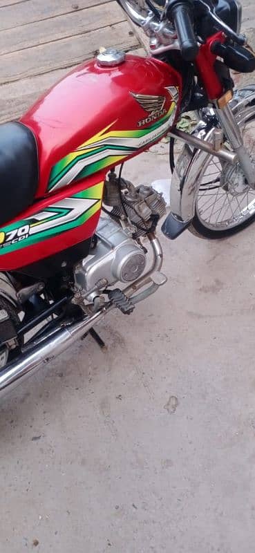 Honda 70 22/23 number 23 me lga hai latter 22 ka hai 0