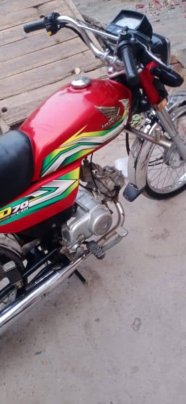 Honda 70 22/23 number 23 me lga hai latter 22 ka hai 1