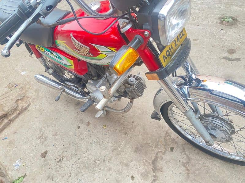 Honda 70 22/23 number 23 me lga hai latter 22 ka hai 11