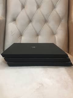 PS4 PRO 1TB (used) with 3 games