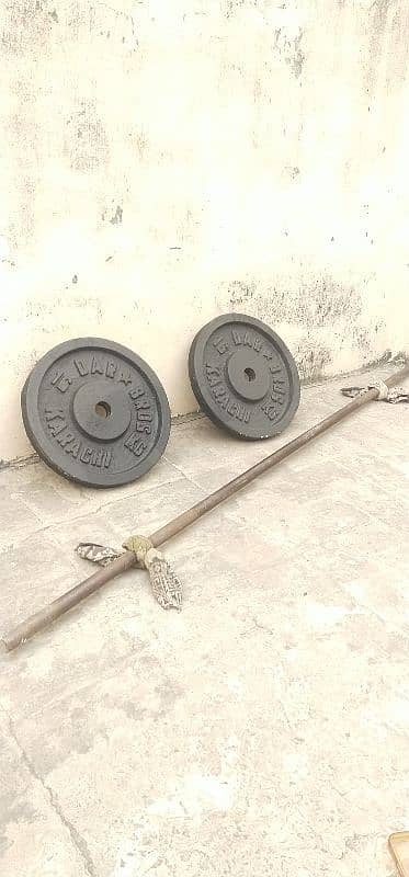 dumbell plates and rod 0