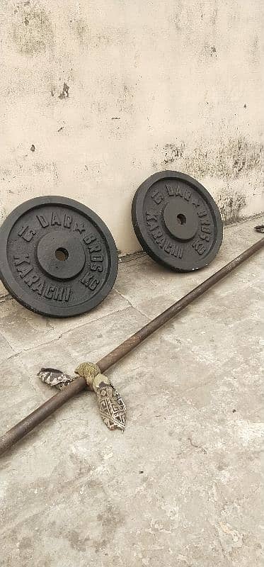 dumbell plates and rod 1