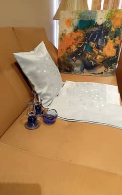 imported decorations with cushions cover and oil painting in blue