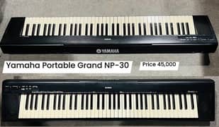 Yamaha Portable Grand NP-30 Digital Piano keyboard Acoustic guitar