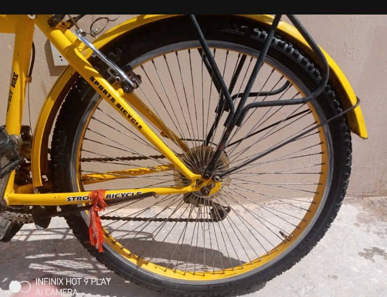 Yellow color gear bicycle for sale is available in Islamabad 7