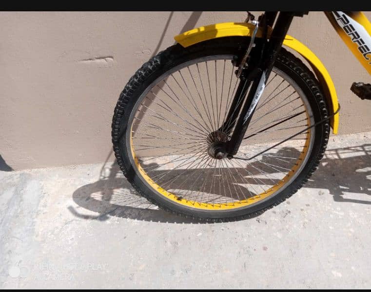 Yellow color gear bicycle for sale is available in Islamabad 9