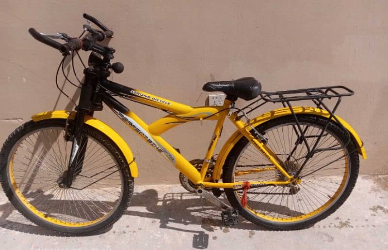 Yellow color gear bicycle for sale is available in Islamabad 12