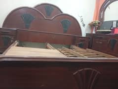 used wooden bed