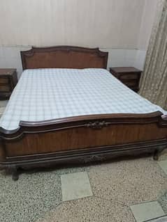 A bed set with side tables and dressing table in shesham wood