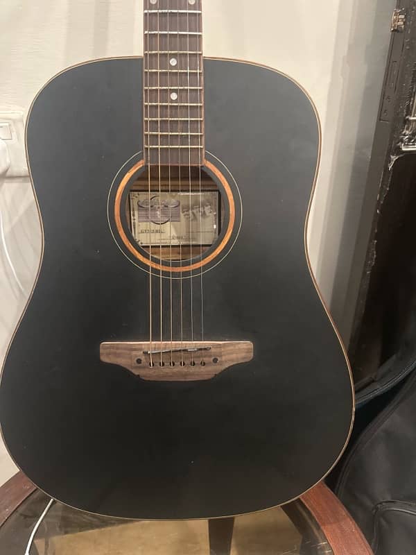 price negotiable Acoustic guitar 10/10 with Bag , String , Belt 1