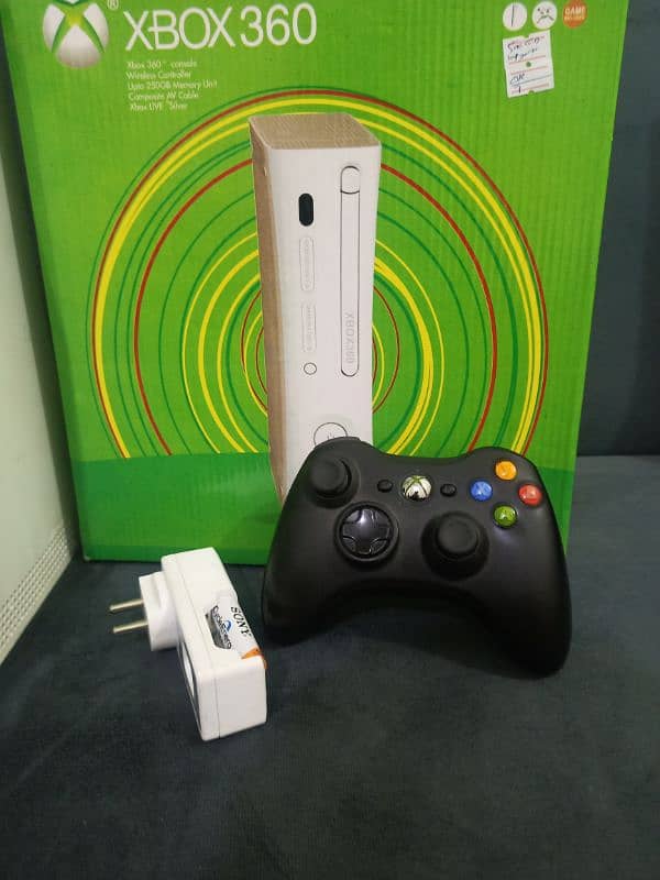 Xbox console with wireless controller and box 2