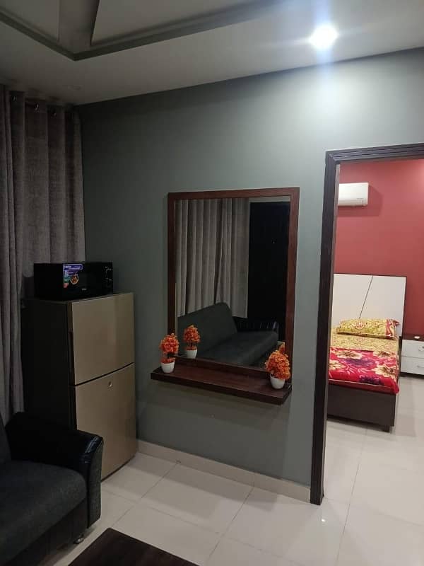 2 BEDROOM FULLY FURNISHE IDEAL LOCATION EXCELLENT FLAT FOR RENT IN SECTOR C BAHRIA TOWN LAHORE 14