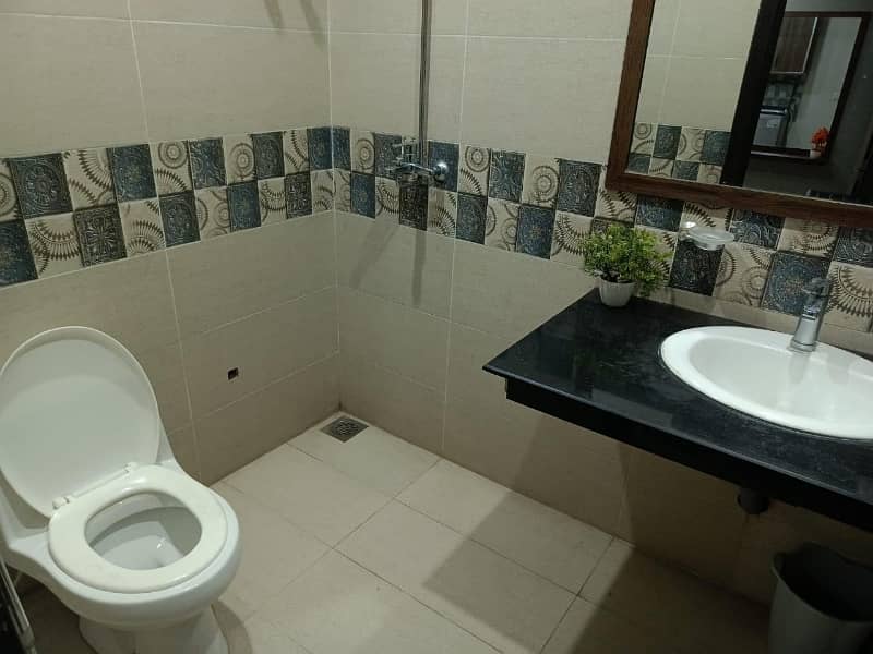 2 BEDROOM FULLY FURNISHE IDEAL LOCATION EXCELLENT FLAT FOR RENT IN SECTOR C BAHRIA TOWN LAHORE 15