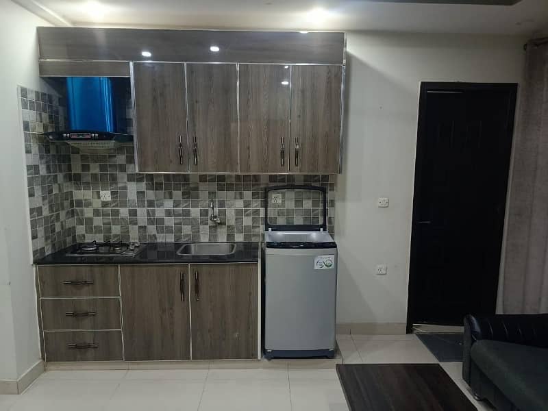 2 BEDROOM FULLY FURNISHE IDEAL LOCATION EXCELLENT FLAT FOR RENT IN SECTOR C BAHRIA TOWN LAHORE 18