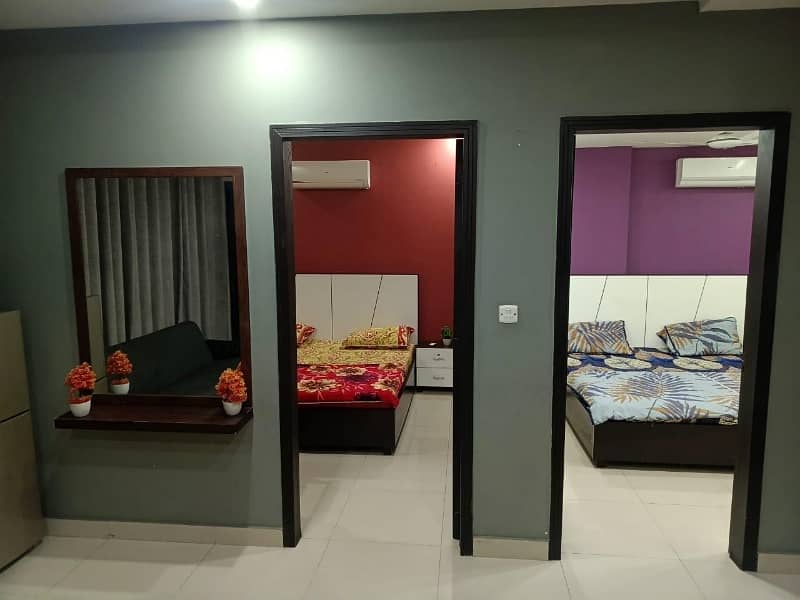 2 BEDROOM FULLY FURNISHE IDEAL LOCATION EXCELLENT FLAT FOR RENT IN SECTOR C BAHRIA TOWN LAHORE 19