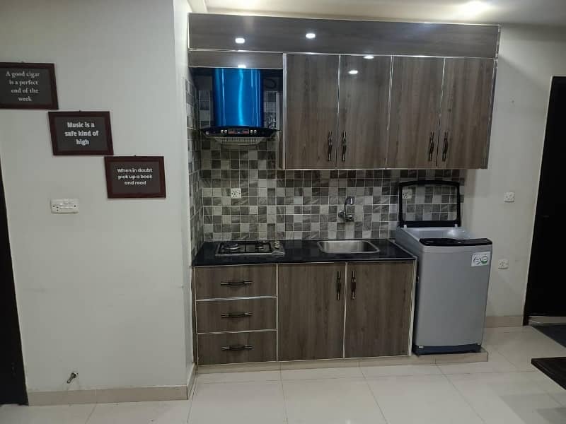 2 BEDROOM FULLY FURNISHE IDEAL LOCATION EXCELLENT FLAT FOR RENT IN SECTOR C BAHRIA TOWN LAHORE 22