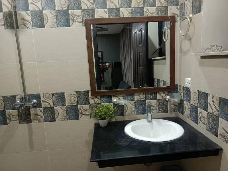 2 BEDROOM FULLY FURNISHE IDEAL LOCATION EXCELLENT FLAT FOR RENT IN SECTOR C BAHRIA TOWN LAHORE 24