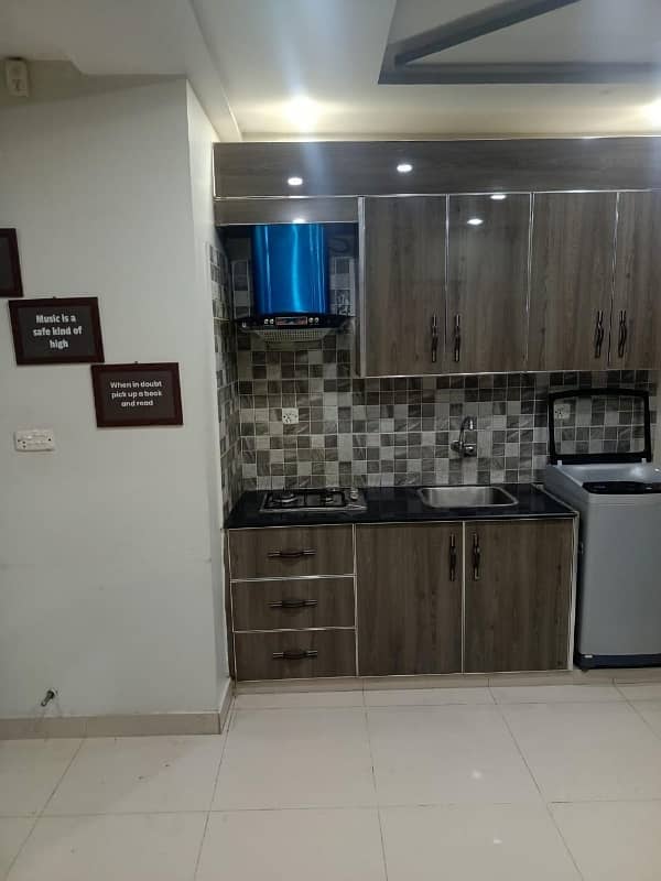 2 BEDROOM FULLY FURNISHE IDEAL LOCATION EXCELLENT FLAT FOR RENT IN SECTOR C BAHRIA TOWN LAHORE 25