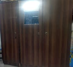 Three door cup board /wardrobe