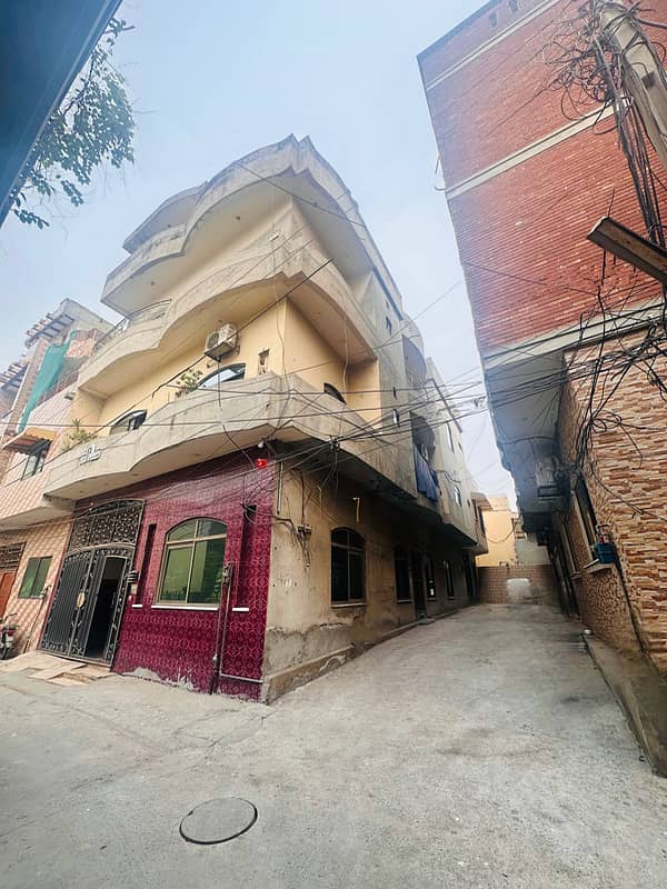 3 story house Corner house for sale in meson road lahore 1